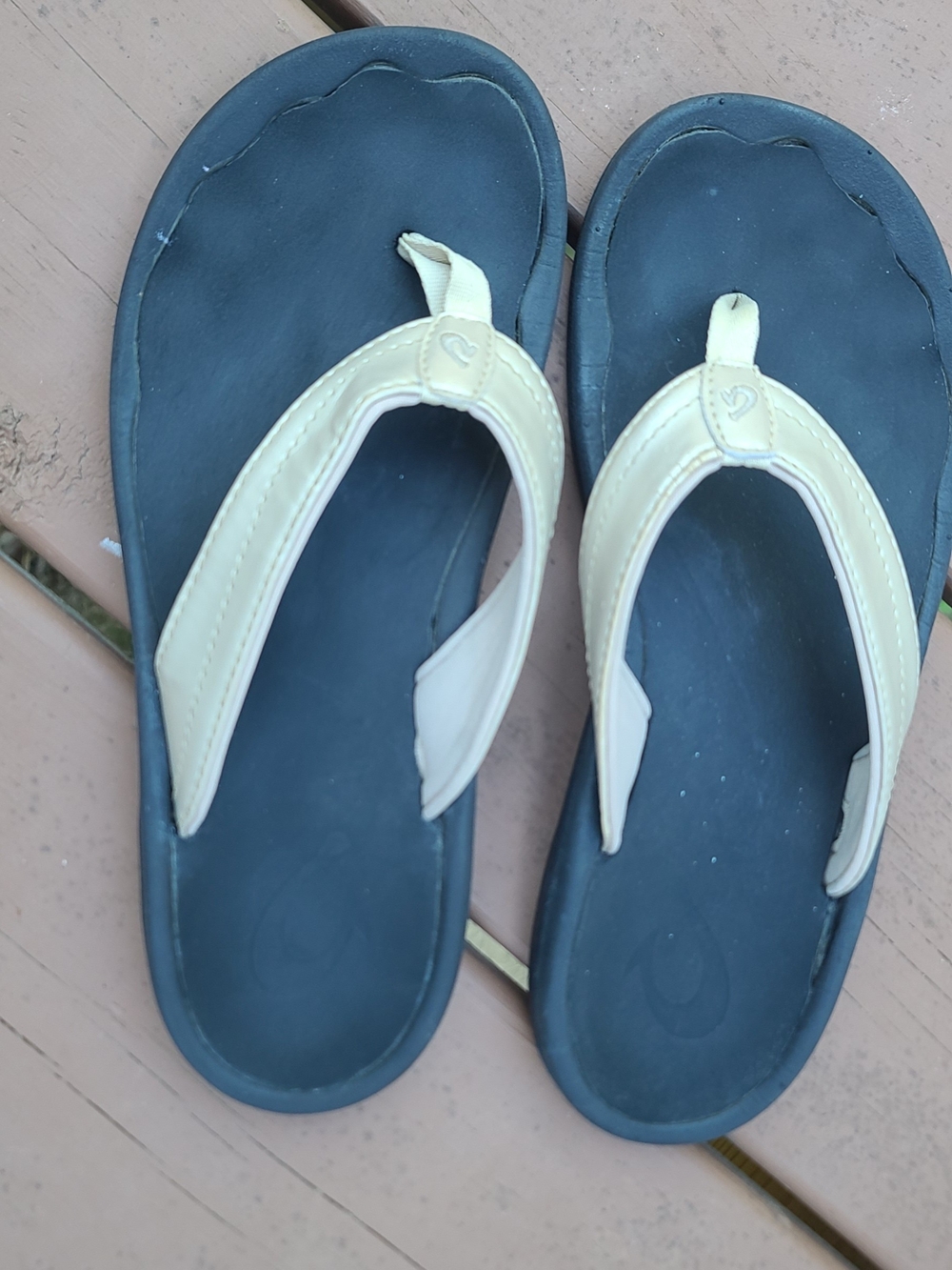 OluKai Black Footbed Sandals with Cream Straps